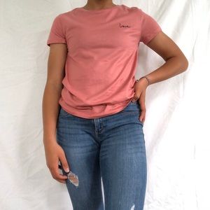 Pink t-shirt with the word love